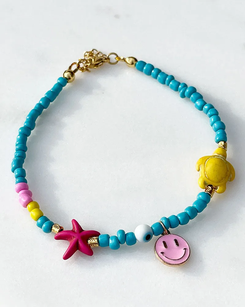 PINK SMILEY SEA TURTLE ANKLET