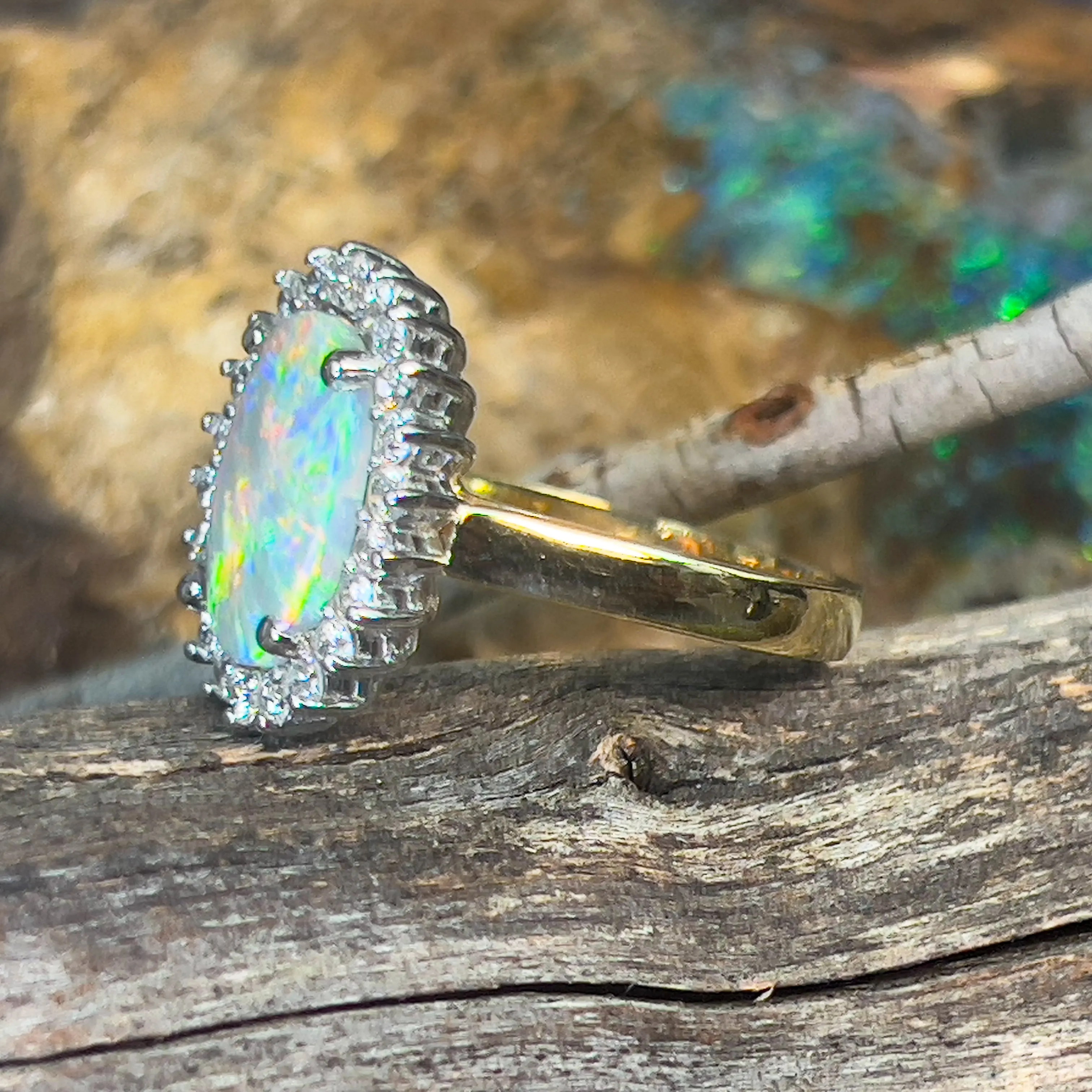 Platinum and 18kt Yellow Gold classic cluster ring with Black Opal and Diamonds