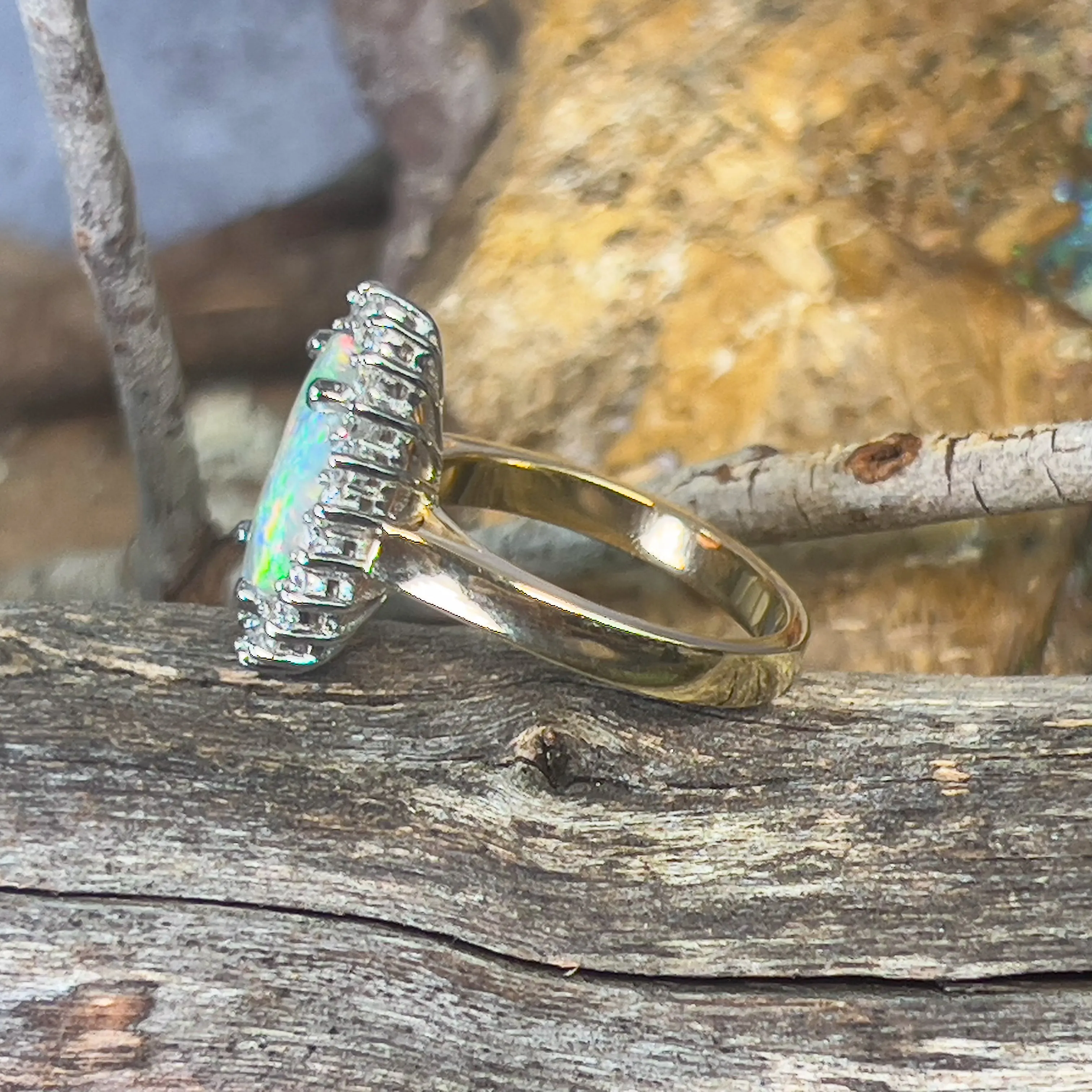 Platinum and 18kt Yellow Gold classic cluster ring with Black Opal and Diamonds