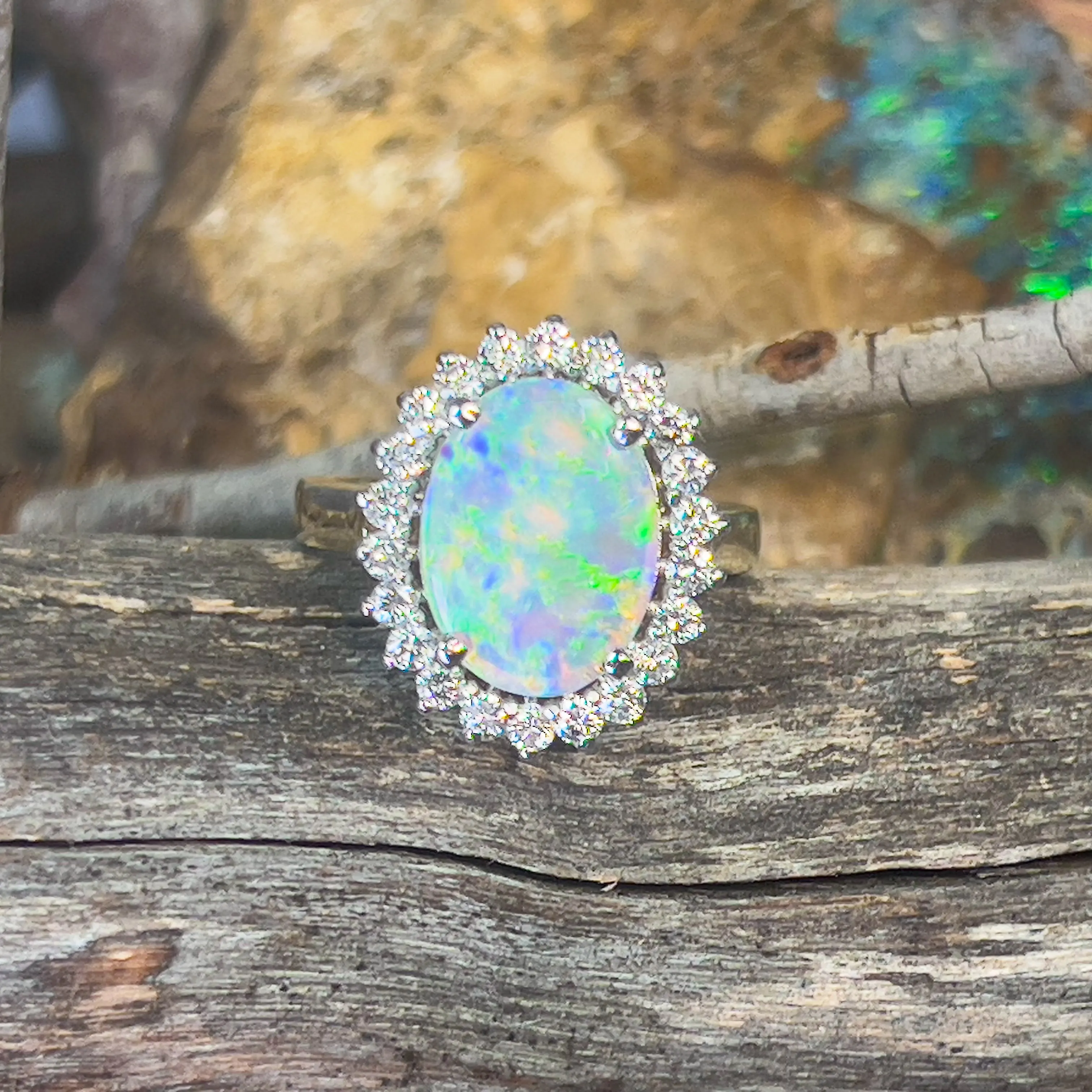 Platinum and 18kt Yellow Gold classic cluster ring with Black Opal and Diamonds