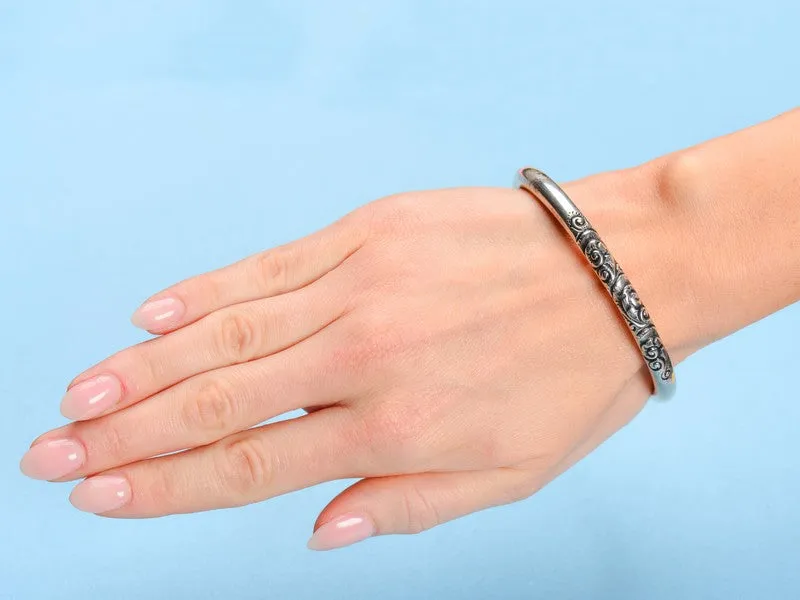 Scrolling Silver Round Bangle Bracelet