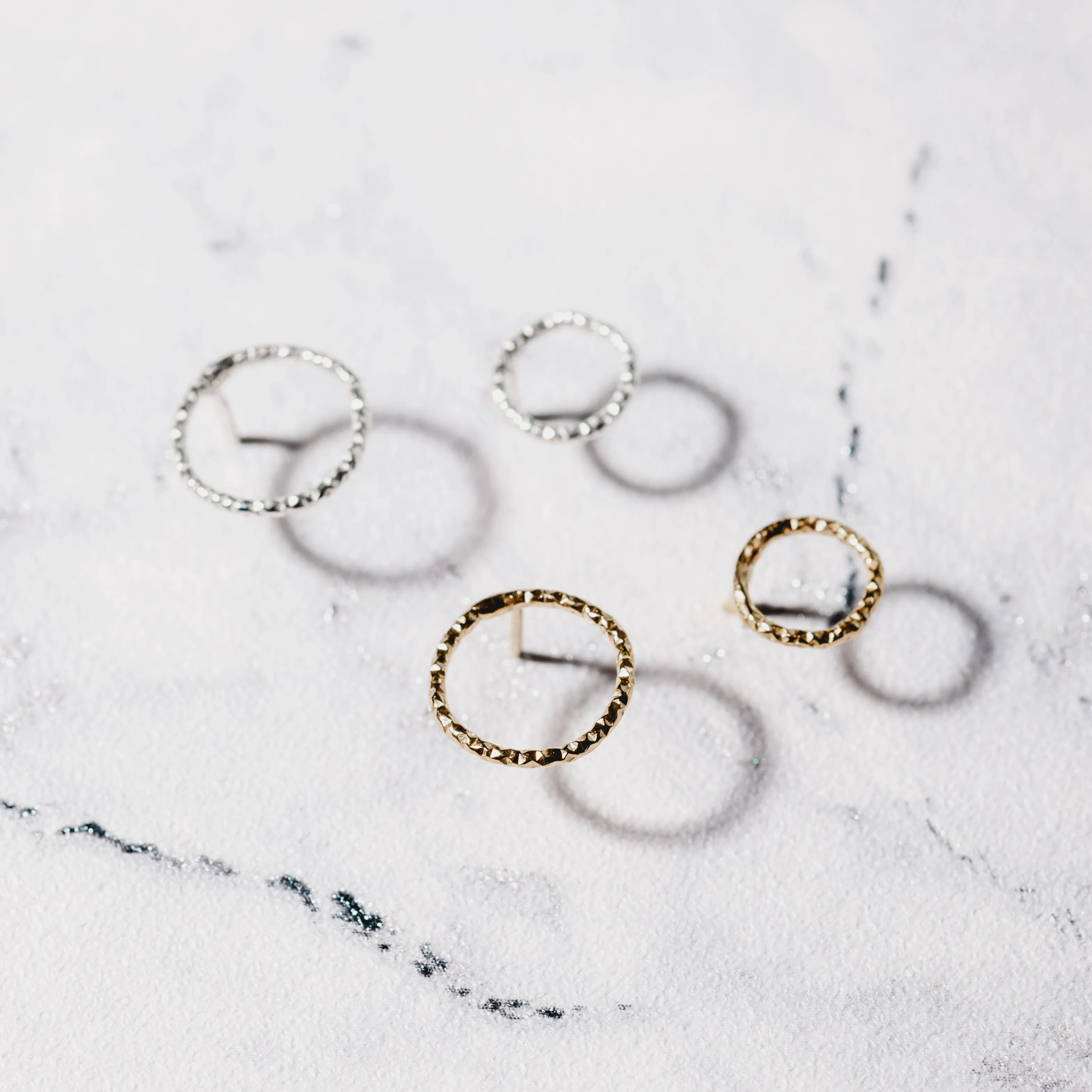 Small golden studs